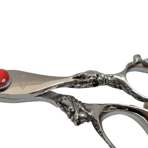Bonika Dragon hair shears handle close-up showing ergonomic offset grip and dragon detailing